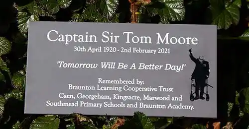 This looks like slate but can be engraved so much smaller. Slate Grey Corian Memorial Plaque