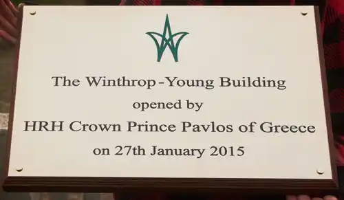 Engraved Brass plaque on wooden backing board