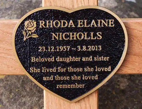 Cast Bronze Heart Spaped Plaque on a Wooden Cross