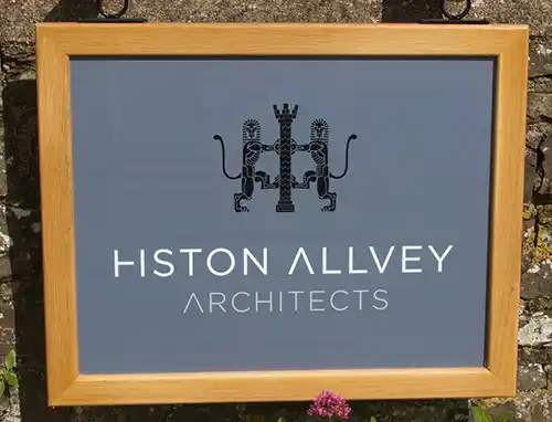 Wood framed hanging sign with cut and printed vinyl lettering and text