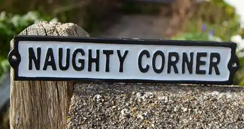 The background was blasted away leaving the lettering raised Naughty Corner Sign
