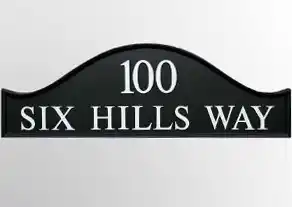 Dome top cast house sign