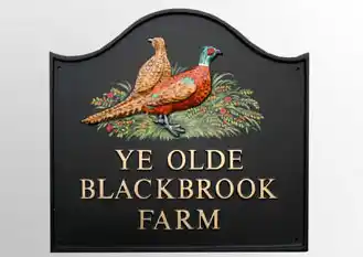 LArge dome top cast house sign with motif