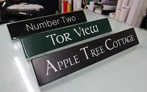 Simple fibreglass signs look perfect on a modern house Hidden Fixings House Signs