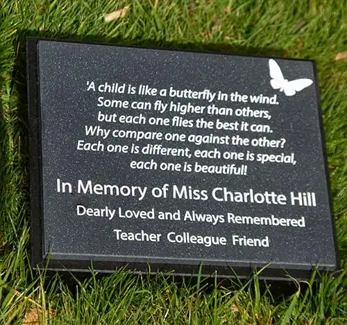 This plaque has been engraved in corian which is very low maintenance. Childs Engraved Memorial Plaque