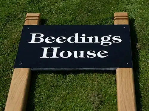 For large stone signs use 90mm x 90mm posts Granite Sign inset into Posts