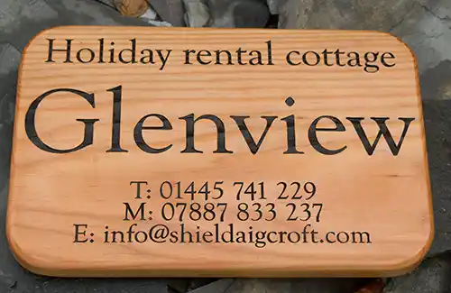Large douglas fir business sign