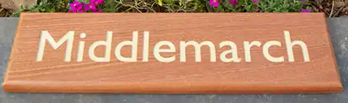 Sapele house sign with painted letters