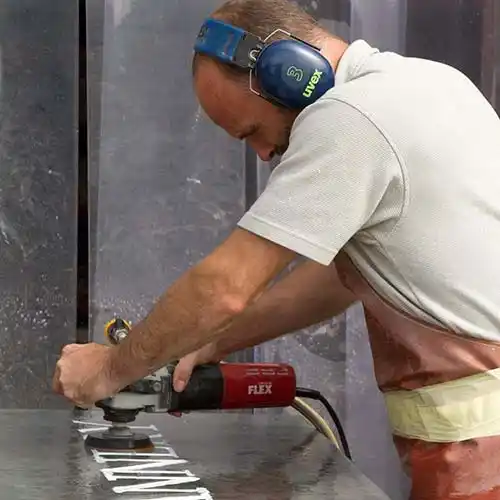 Each slate doorstep is crafted individually. Polishing Slate