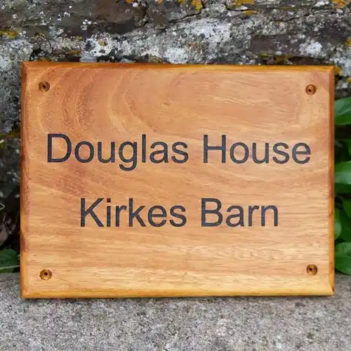 Iroko is similar to Teak - full of oil and durable. Irolo Wood House Sign