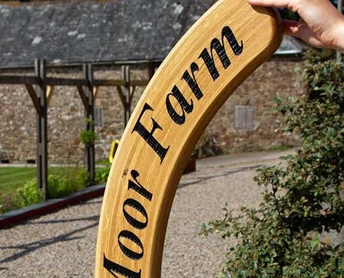 This was made from many layers of thin oak glued together. Oak Hockey Stick Sign