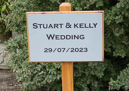 Natural wood free-standing sign with a plaque Natural Wood Free Standing Sign