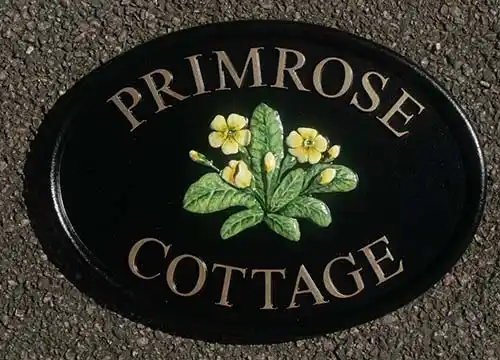 Cast Oval House Sign With Motif