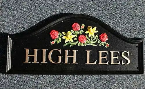 Domed Top Sign with Raised Motif