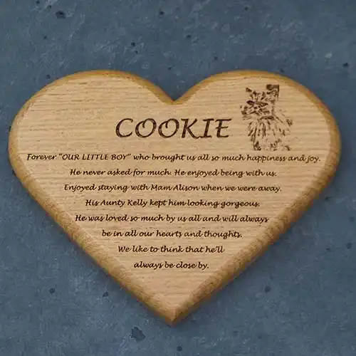 This memorial was for a much loved pet cat, Wooden Heart Memorial