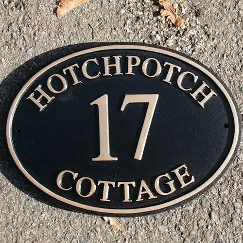 This sign includes house name and number. Oval House Sign with Number