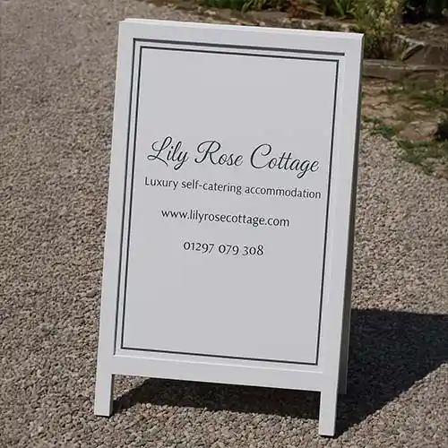 Painted harwood frame with painted lettering